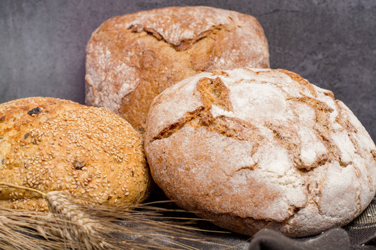 Farmers homemade organic wheat, barley and rye bread in assortment