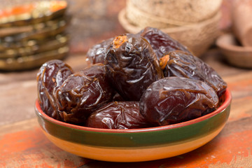 Traditional Middle East dessert, healthy food, big medjool dates fruits.