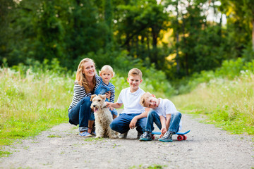 Family with fox terrier dog