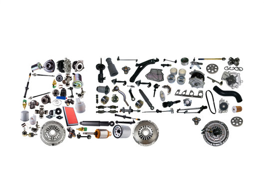 Images truck assembled from new spare parts on white background. Truck with a trailer and with cargo