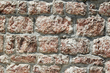 Old grey stone wall background 