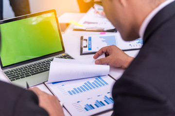 business team meeting concept : people group hand plan financial chart graph