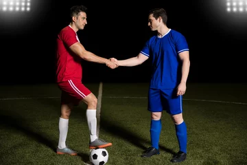 Foto op Plexiglas Players handshake at soccer field center © AntonioDiaz