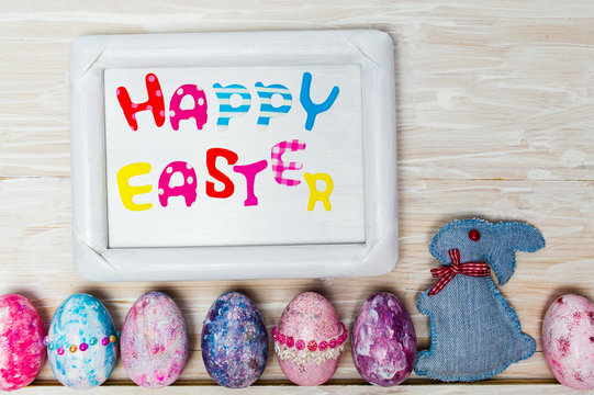 Happy Easter card with creative painted eggs