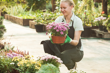 Woman gardener with pots