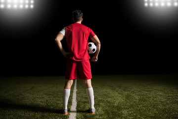 Male footballer standing in stadium with a ball © AntonioDiaz