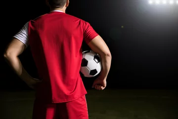 Rolgordijnen Sportsman in stadium with soccer ball © AntonioDiaz