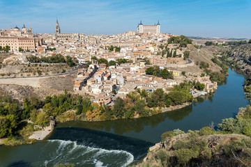 Fototapeta na wymiar Toledo and the river Tagus in Spain on a sunny day