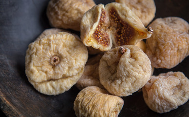 dry figs in rustic wooden bowl dry fruits