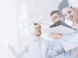 Fototapeta premium Young business team meeting in the office