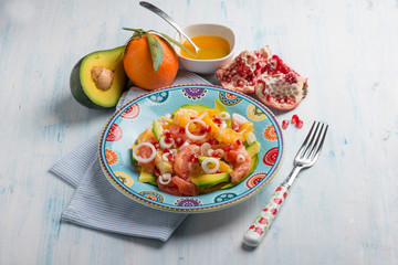 salad with avocado grapefruit orange and pomegranate