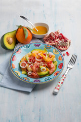 salad with avocado grapefruit orange and pomegranate