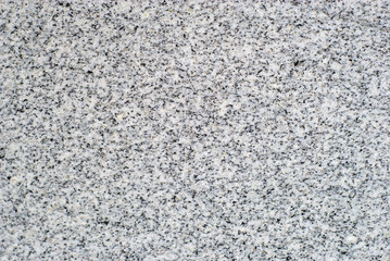 background, texture - surface of a polished slab of gray variegated granite