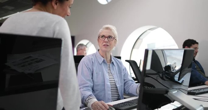 Senior woman on computing course