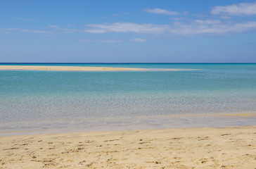 Fototapeta na wymiar Ocean wave water on beautiful Jandia beach, Morro Jable, Fuerteventura, Canary Islands, Spain