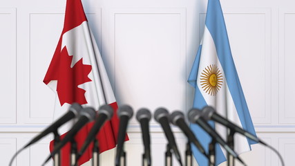 Flags of Canada and Argentina at international meeting or conference. 3D rendering