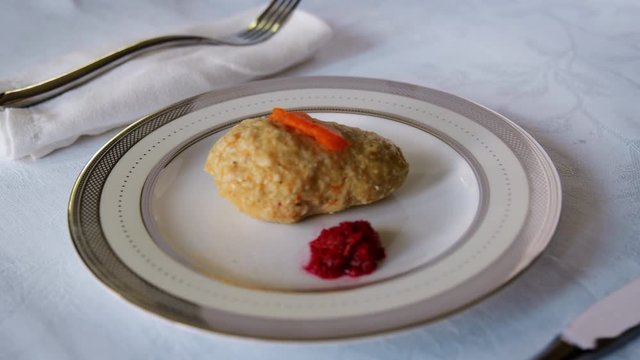 Jewish passover appetiser of gefilte fish and horseradish
