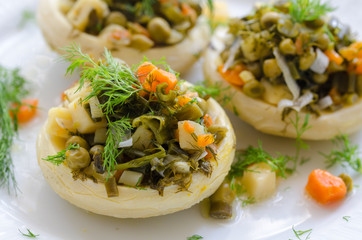 Artichokes filled with potatoes, peas, onions, carrots. Delicious healthy vegetarian food.