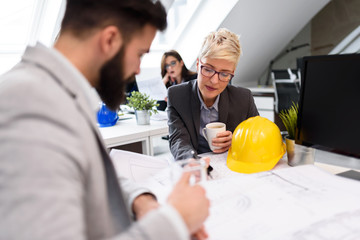 Group of young business people working at their office studio