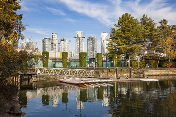 View of Granville Island and downtown hi-rises, with False Creek in the foreground