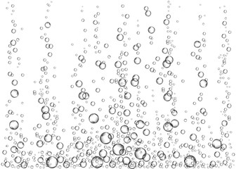 Underwater fizzing air bubbles or soda pop  on white  background.