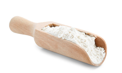 Fototapeta na wymiar Wheat flour in wooden scoop on white background