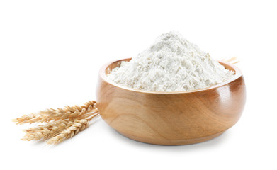 Wheat flour in bowl on white background