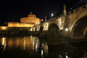 Obraz premium Castel St. Angelo and St. Angelo Bridge in the night Rome, Italy