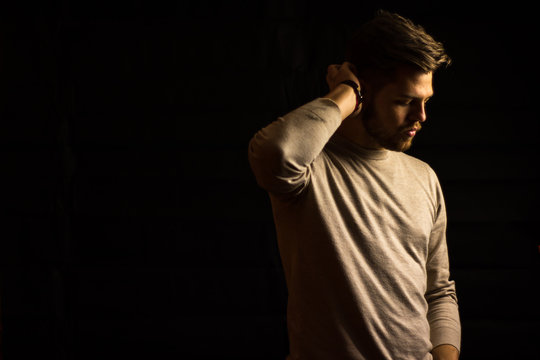 portrait of an attractive male model in a studio shooting