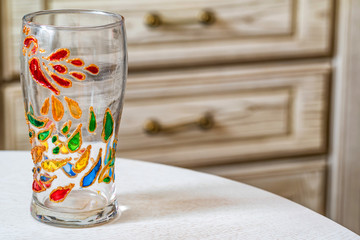 Glass vase with colorful hand painting