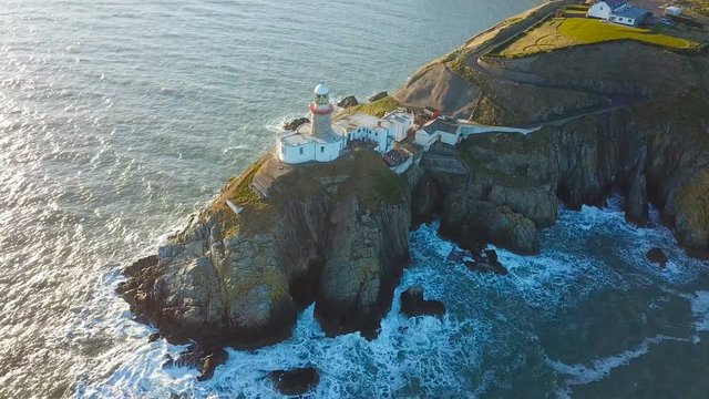 aerial view of beautiful lighthouse on a cliff in Howth, Ireland
