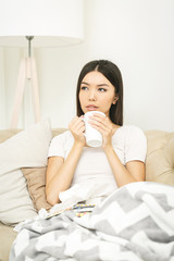 Sick woman lying in bed with high fever. Cold, flu, fever and migraine