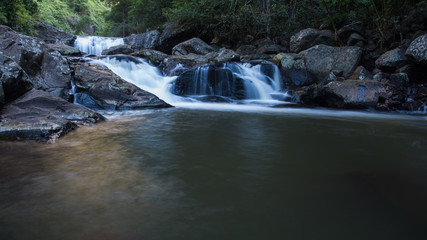 Fototapeta na wymiar Tropiccal forest waterfall in Gold Coast hinterland, Queensland, Australia