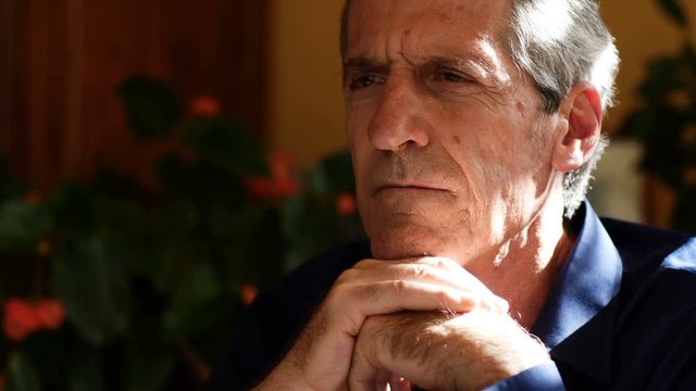 portrait of Pensive mature man reflecting on the future