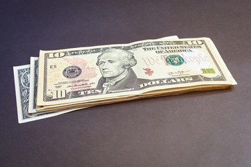 Dollars banknotes on dark background. Cash Money American Dollars.
