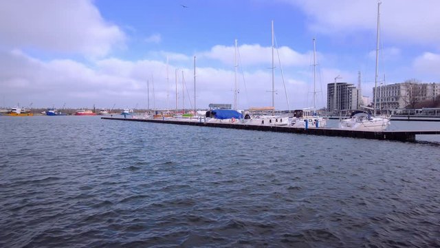 Cloudy and windy day at the Tomis boats port