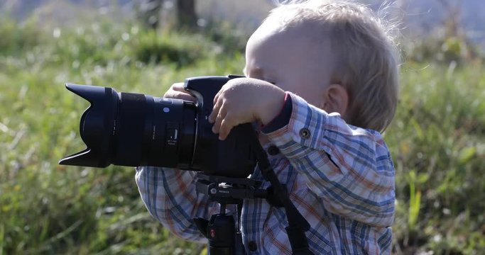 Little photographer in the nature
