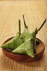 Ketupat on a woven tray, a Malaysian sticky rice usually served during festive season.