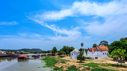 historical place, Wat Ubosatharam. The temple houses many artifacts such as wall murals representing the style of early Rattanakosin period