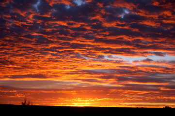 Colorful sunset in the desert badlands of Bisti/De Na Zin in Northern New Mexico