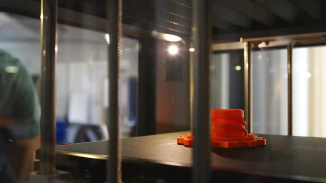 Male College Student Printing 3D Object In Design Lesson