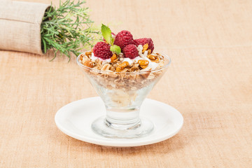 healthy cereal breakfast with greek yogurt and raspberries