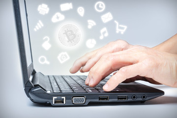 Fototapeta na wymiar Laptop With Bitcoin and Media Icons