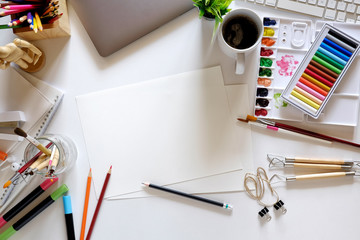 Conceptual image of Artist graphic designer workplace white table.