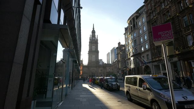 A church in the sunlight at the end of a street