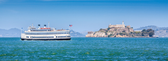 Alcatraz Island with historic excursion boat, San Francisco, California, USA