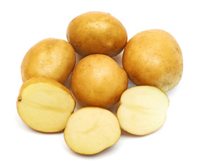 Young potatoes whole and slice isolated on white background. Harvest new. Flat lay, top view