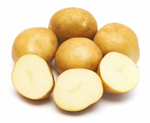 Young potatoes whole and slice isolated on white background. Harvest new. Flat lay, top view