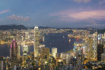 Panorama of Victoria Harbor of Hong Kong city at dusk