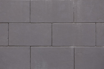 Gray wall of concrete blocks